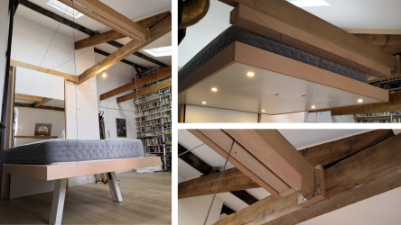lit escamotable au plafond fixé sur une charpente bois